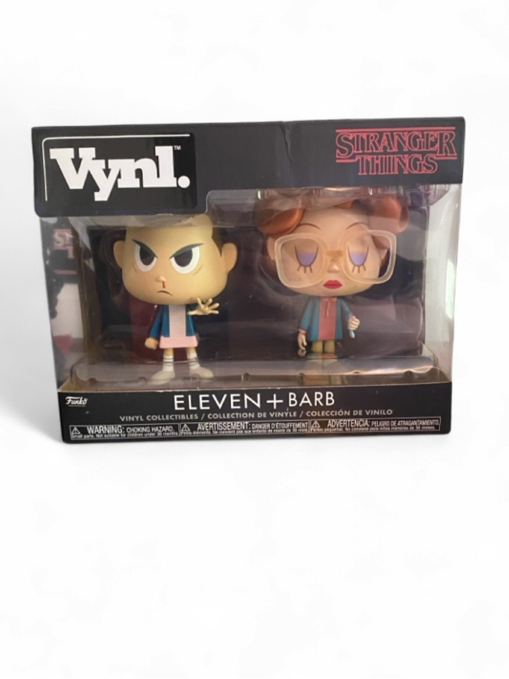 Vynl. Stranger Things Eleven + Barb Vinyl Figure Set - Pink/Blue/Brown